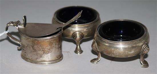 A pair of George III silver bun salts and a later silver mustard pot.